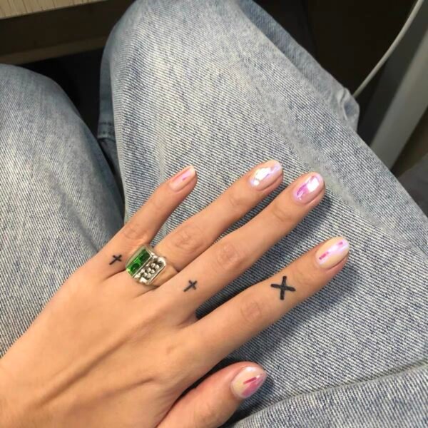 Small cross on the finger - Image 2